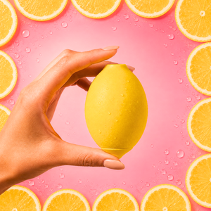 Compact Lemon Calm Device held in one hand